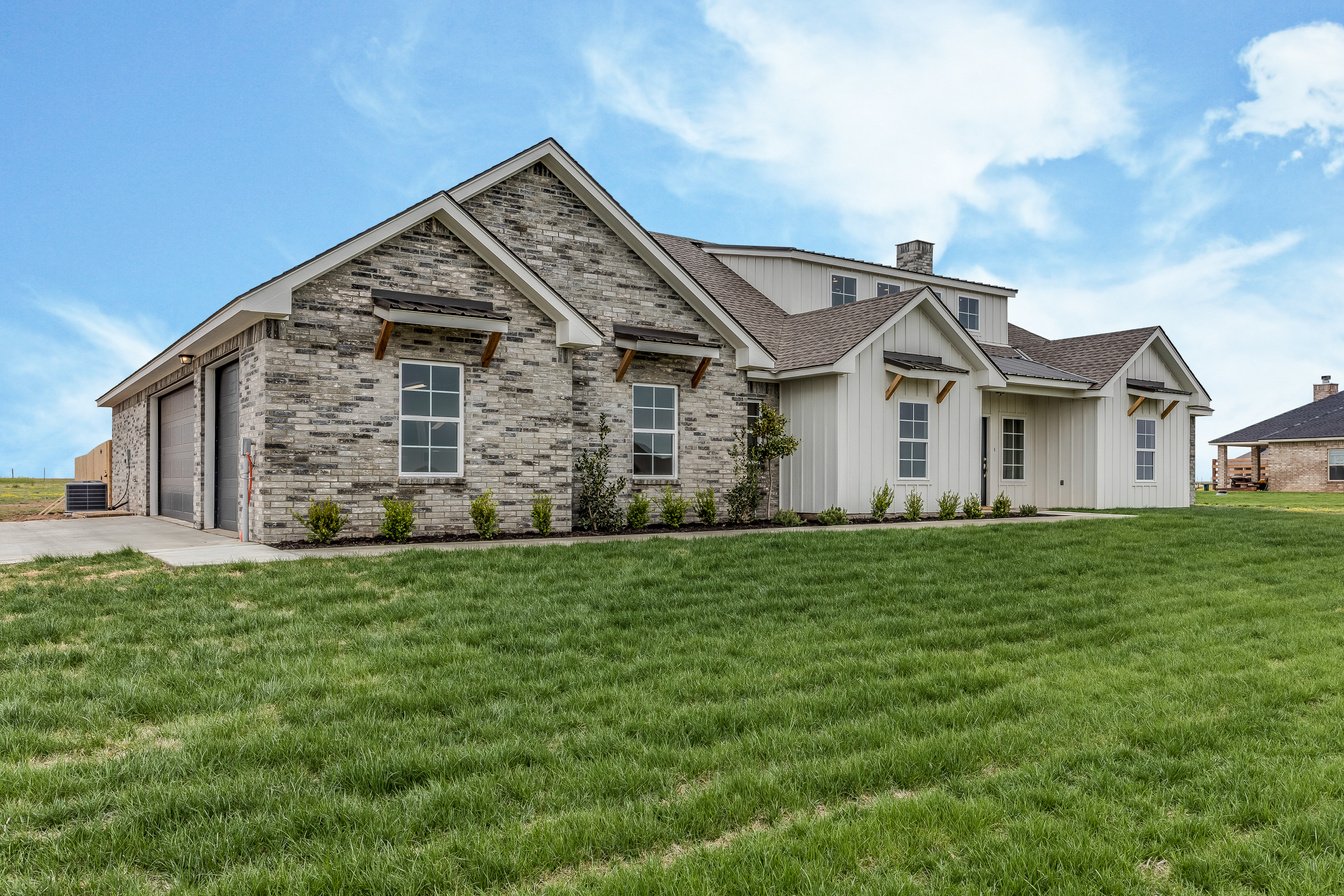 Texas home with brick and board and battin